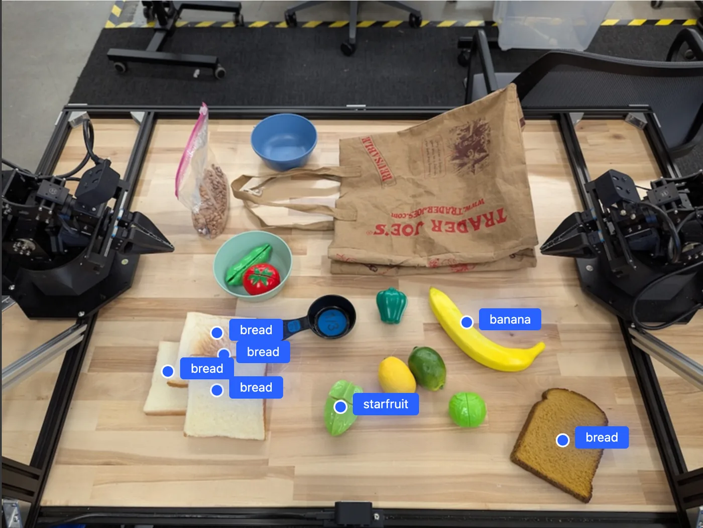 Robot perception output pointing to fruit and objects on a tabletop