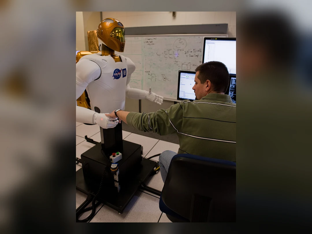 Engineer working on Robonaut 2 developed by NASA and General Motors