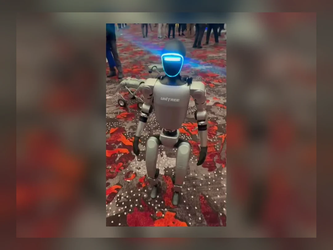Unitree G1 humanoid robot standing inside an event venue