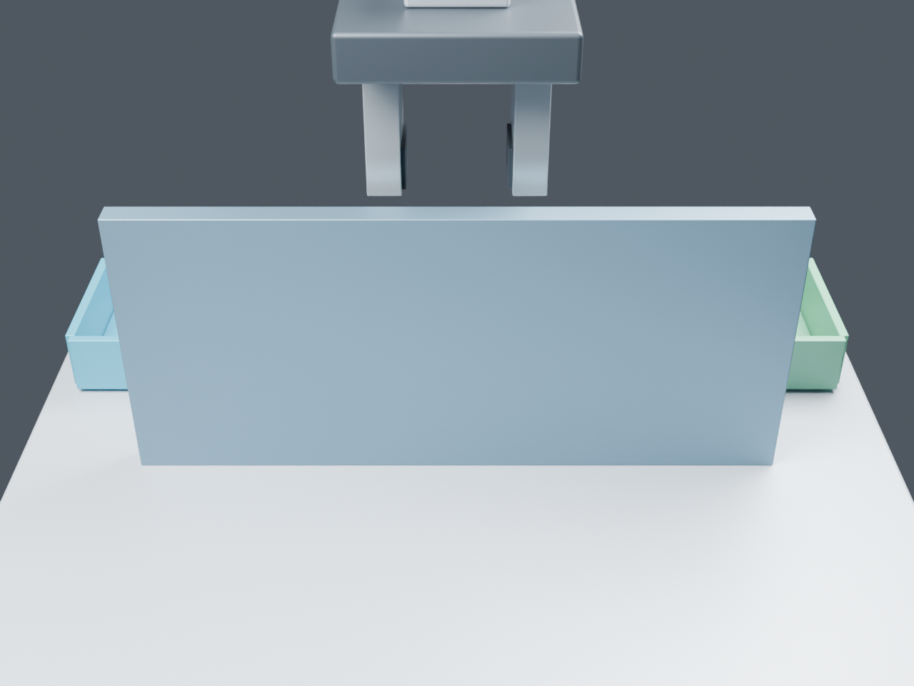 Layout A from the observation camera: the divider hides the cube beneath the stationary gripper.