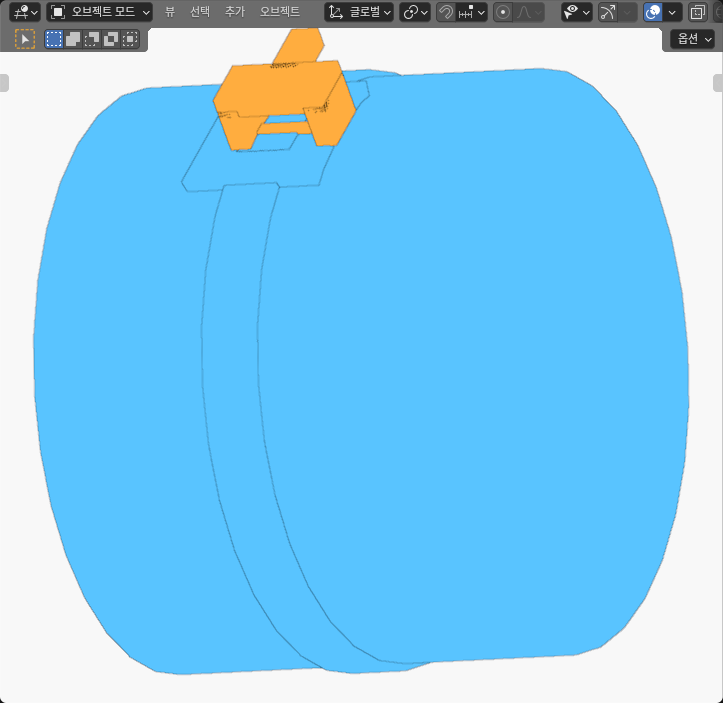 Original Blender SOLID view of the blue coil and strap with the orange open head in the lap-facing, axially offset configuration.